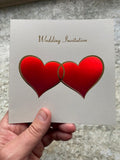 Wedding Invites- Entwined Red Metallic Hearts with gold foil trim and text