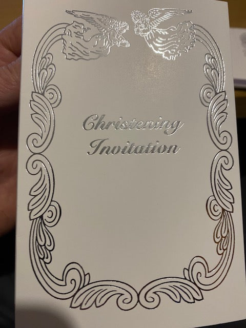 Decorative card with ornate border and text on a plain background